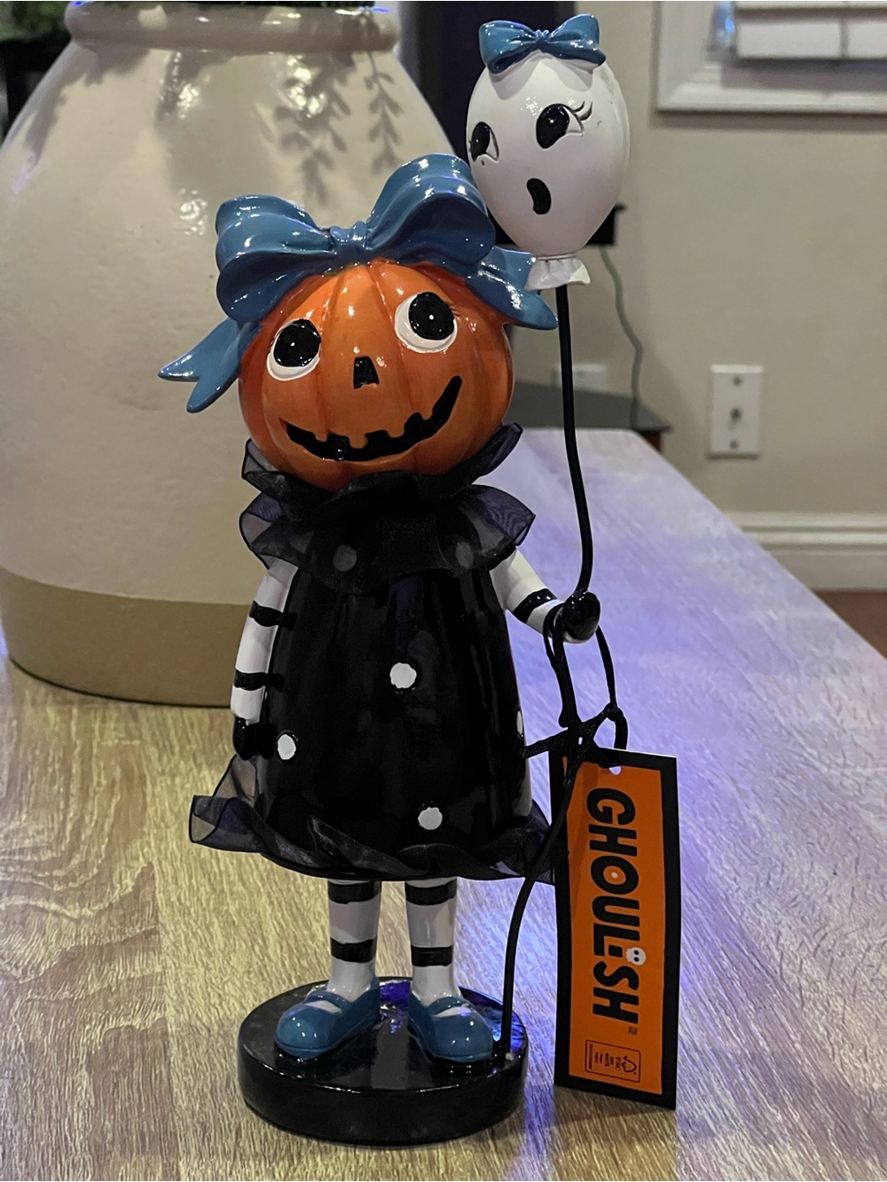 Halloween Pumpkin Girl Figurine with Blue Bow and Ghost Balloon